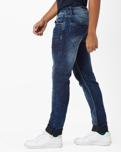 Skinny Fit Distressed Mid-Rise Jeans (Image - 3)