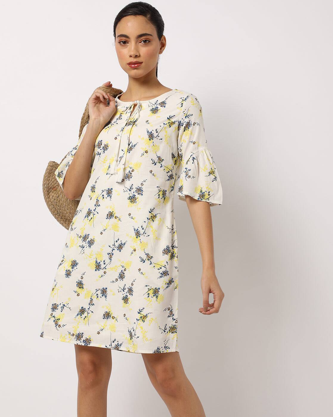 cream shift dress with sleeves