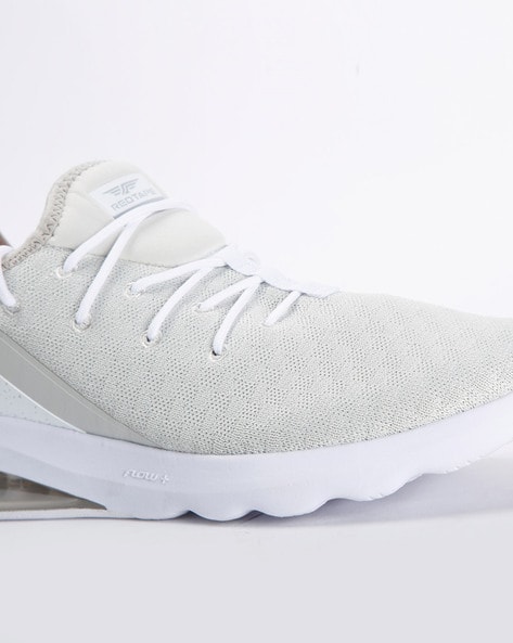 red tape sports shoes white
