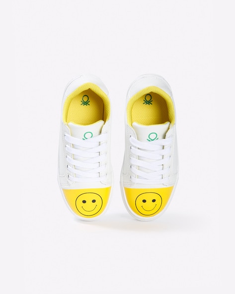 white yellow shoes