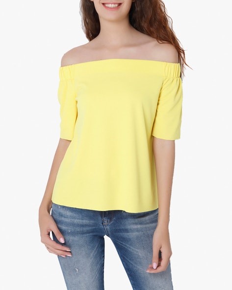 yellow top off shoulder