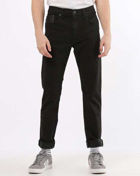 levis black tapered jeans