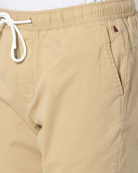 Buy Khaki Trousers & Pants for Men by AJIO Online