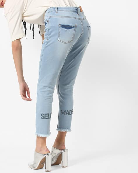 blue jeans with frayed hem
