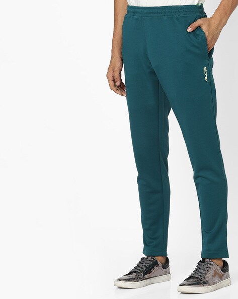 teal track pants