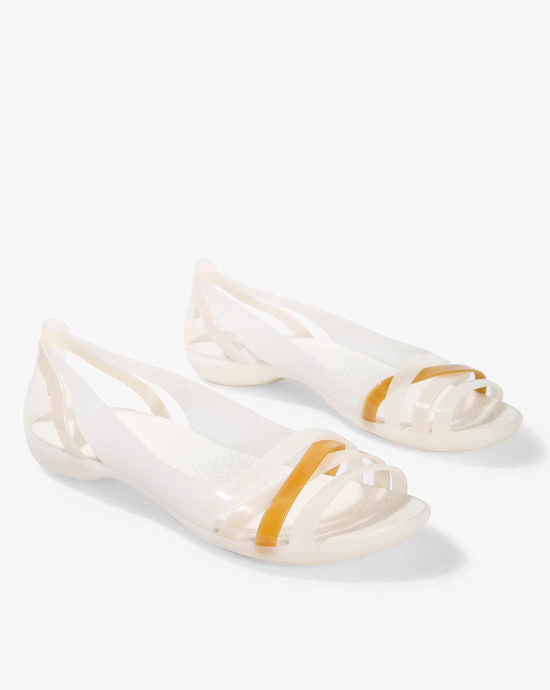 white and yellow crocs