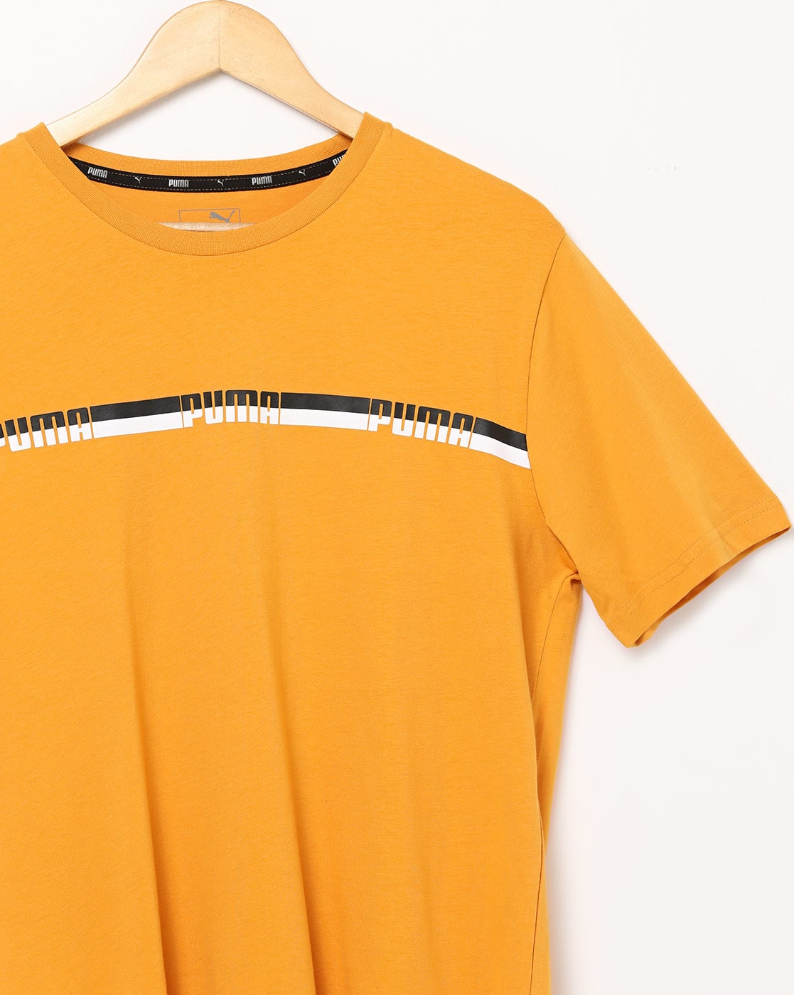 yellow puma shirt