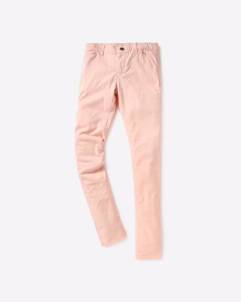 pink cut up jeans