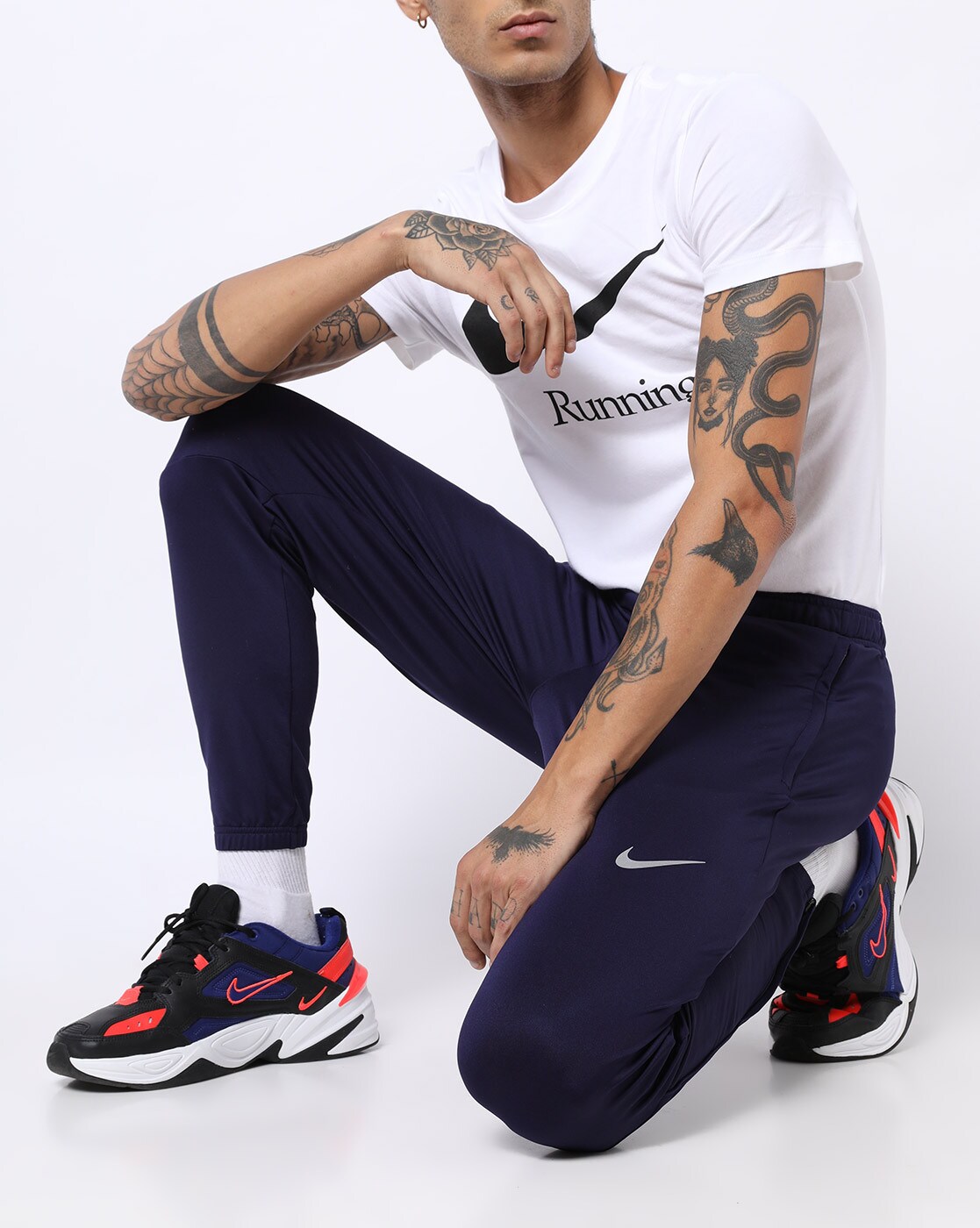 nike track pants zip leg