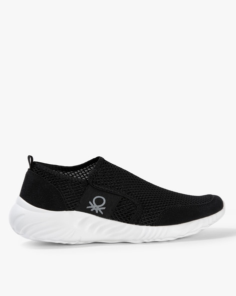 ucb black slip on sneakers