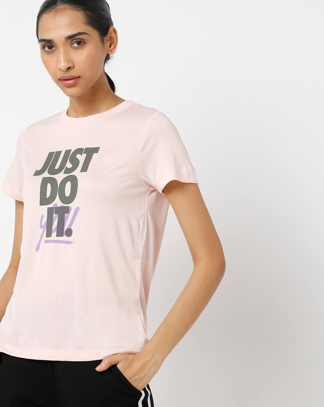 peach nike shirt