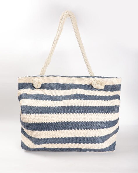 navy blue and white handbags