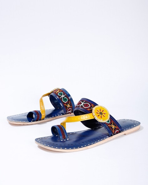 in blue chappals