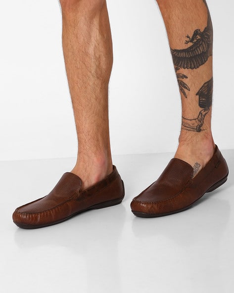 red tape slip ons