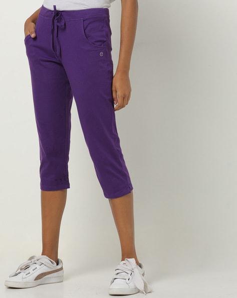 purple track shorts