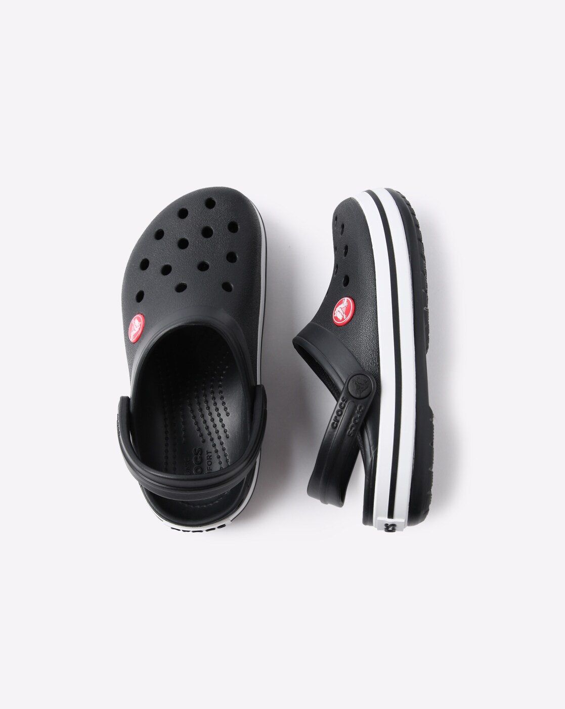 black crocs with white stripe