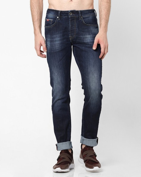 low rise tapered jeans