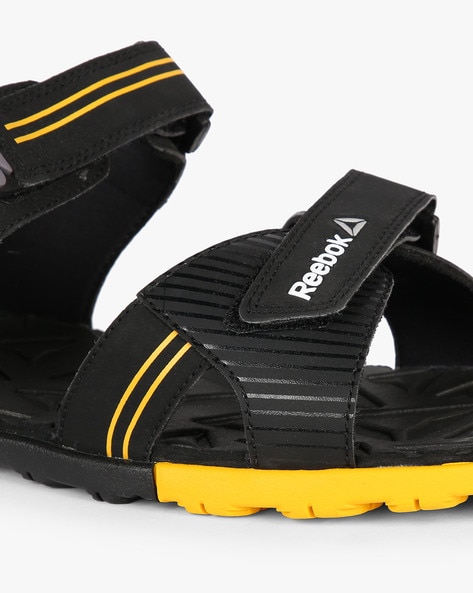 reebok sandals yellow