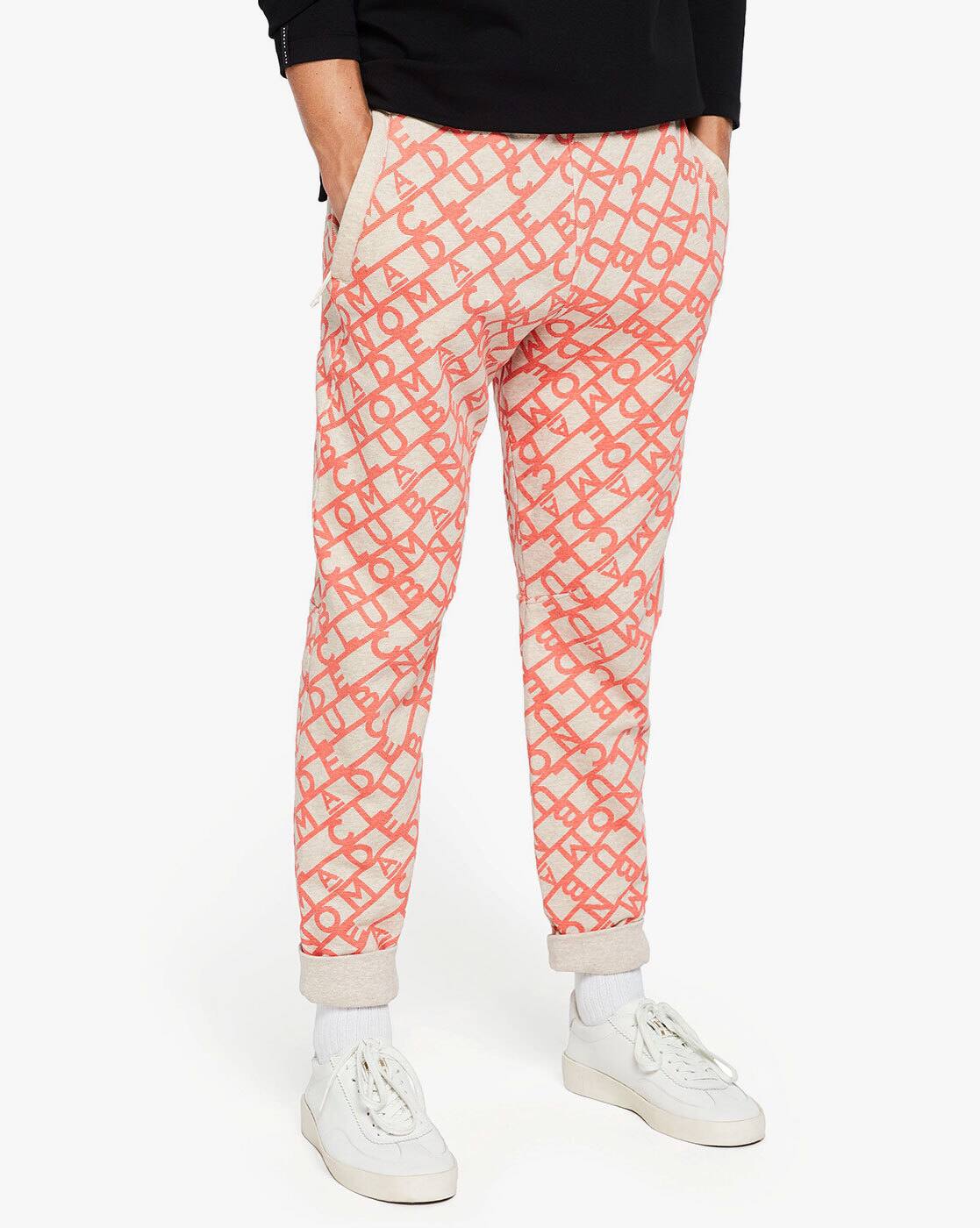 grey and orange track pants