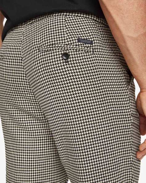 BOWIE WIDE-FIT HOUNDSTOOTH TROUSERS IN MANDARIN