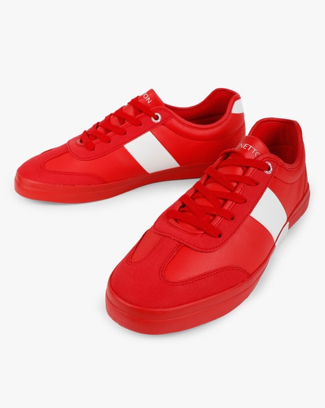ucb red sneakers