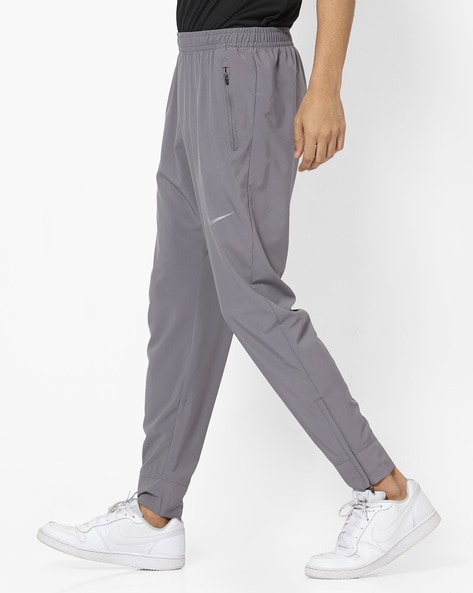 Buy Grey Track Pants for Men by NIKE Online