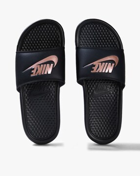 gray nike flip flops