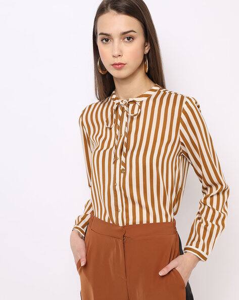 women's brown and white striped shirt