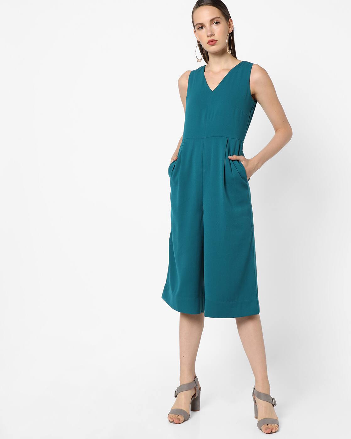 teal colored jumpsuits