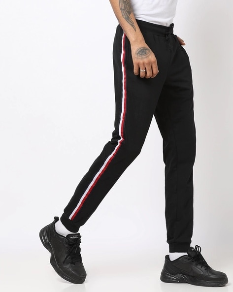 Buy Off White Track Pants for Men by BISTRO Online | Ajio.com