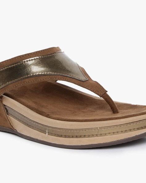 bronze flip flops