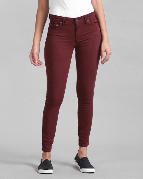 rust skinny jeans
