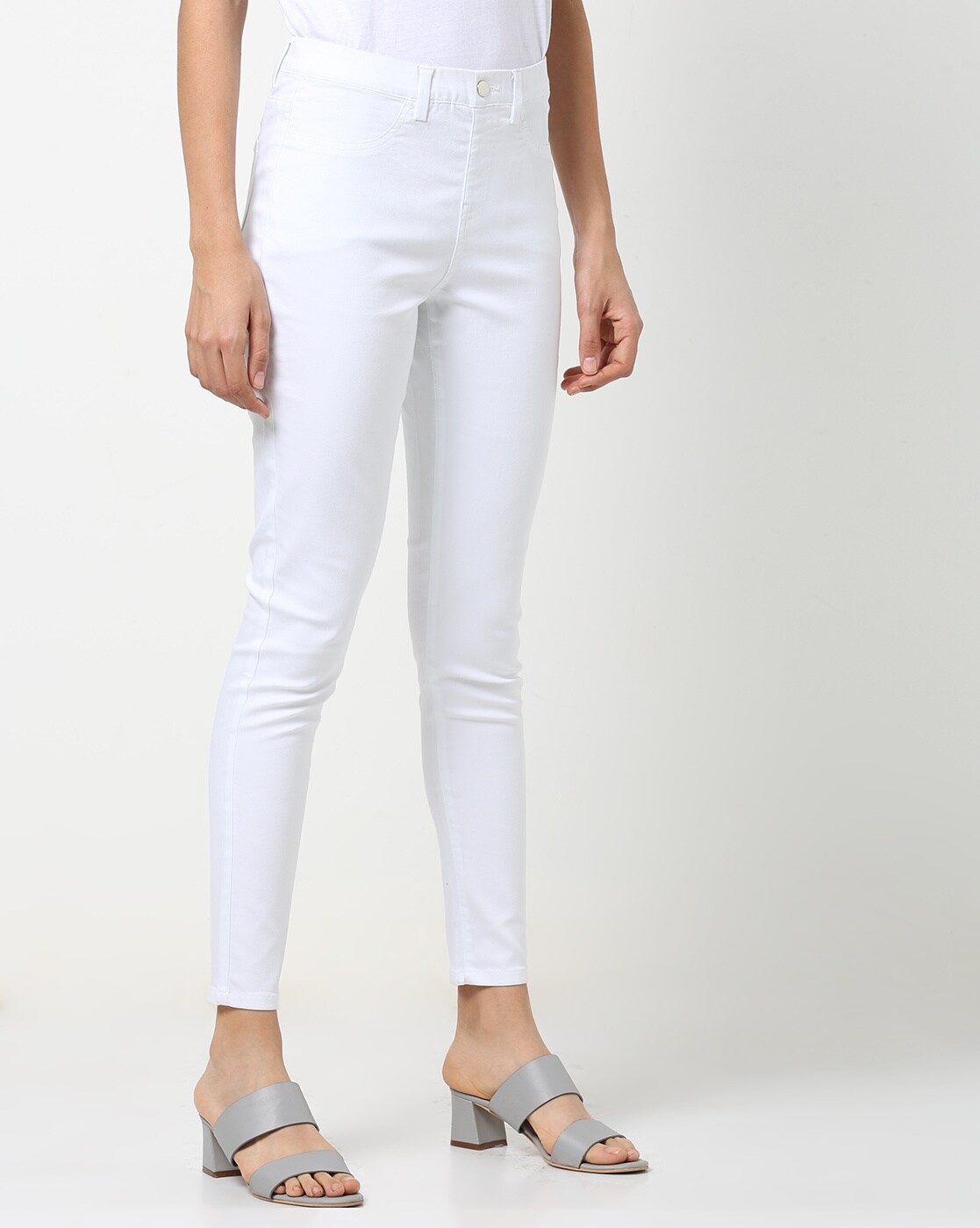 white ankle trousers