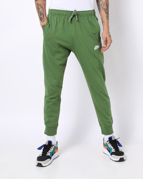 green nike track pants