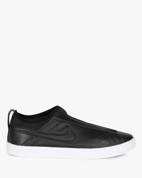 nike racquette slip on