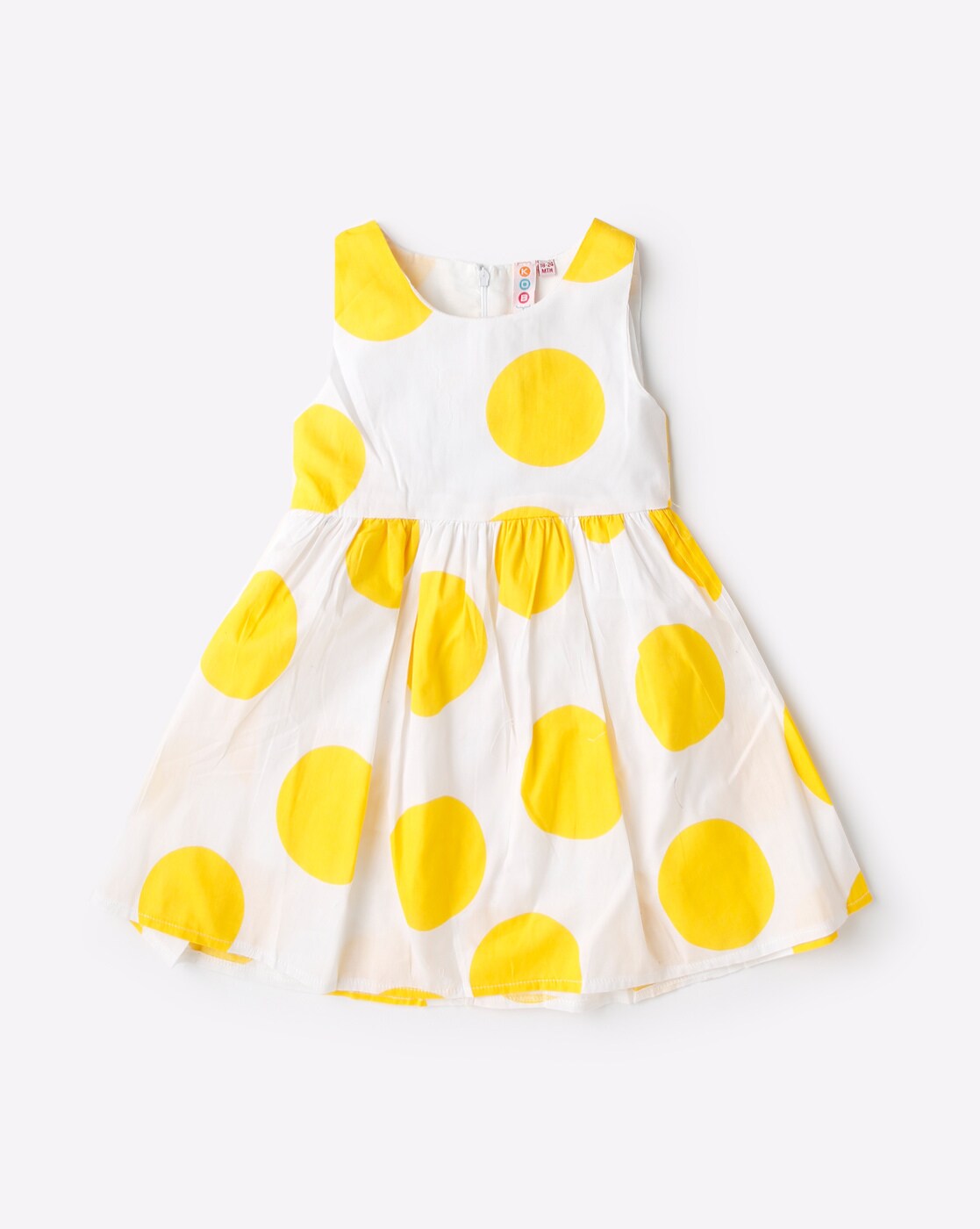 yellow dress with white polka dots