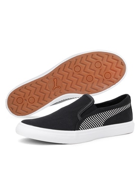 Puma black sale slip on