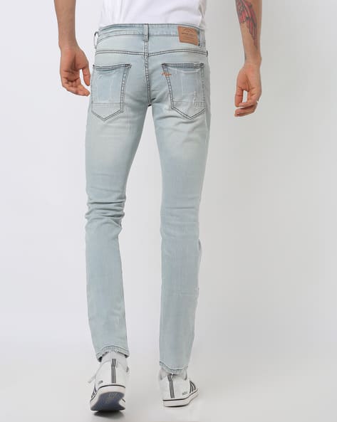 Low-Rise Skinny Fit Distressed Jeans (Image - 3)