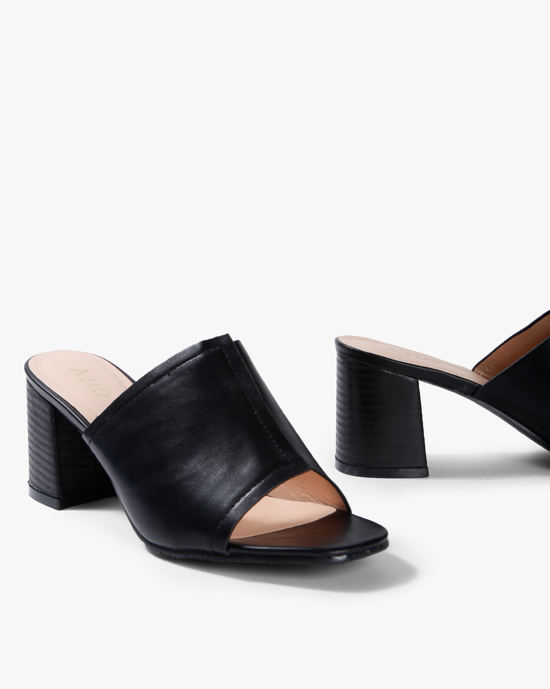 closed toe heeled mules