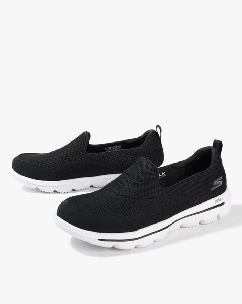 black slip on sports shoes