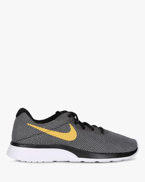 Buy Grey Sports Shoes for Men by NIKE Online