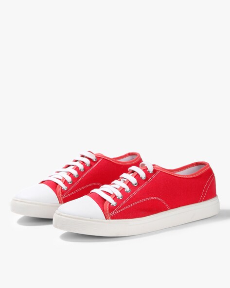 Red canvas lace up hot sale sneakers