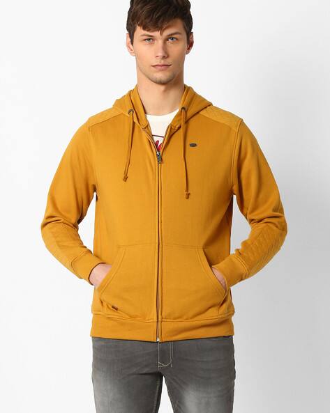 mustard yellow sweatshirt