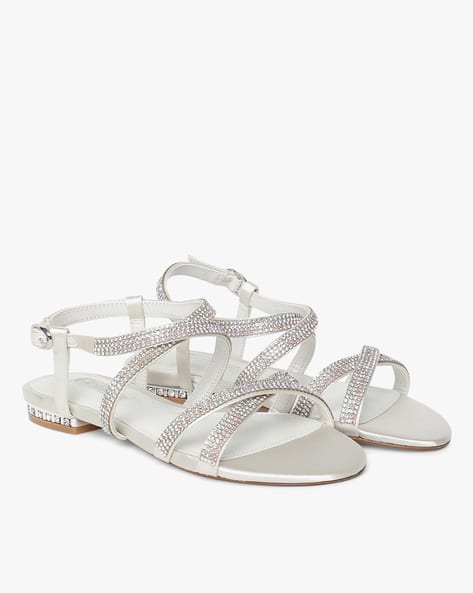 white embellished flat sandals