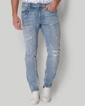 slim tapered distressed jeans