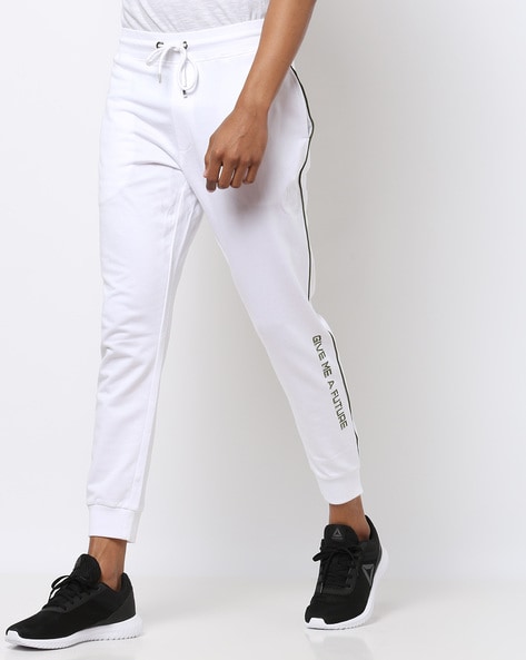 Buy Reebok Men Cream Coloured Track Pants - Track Pants for Men 204486 |  Myntra