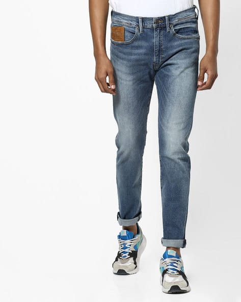 512 Mid-Wash Performance Slim Tapered Jeans