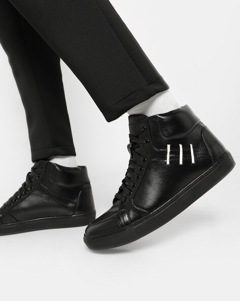 glossy black sneakers