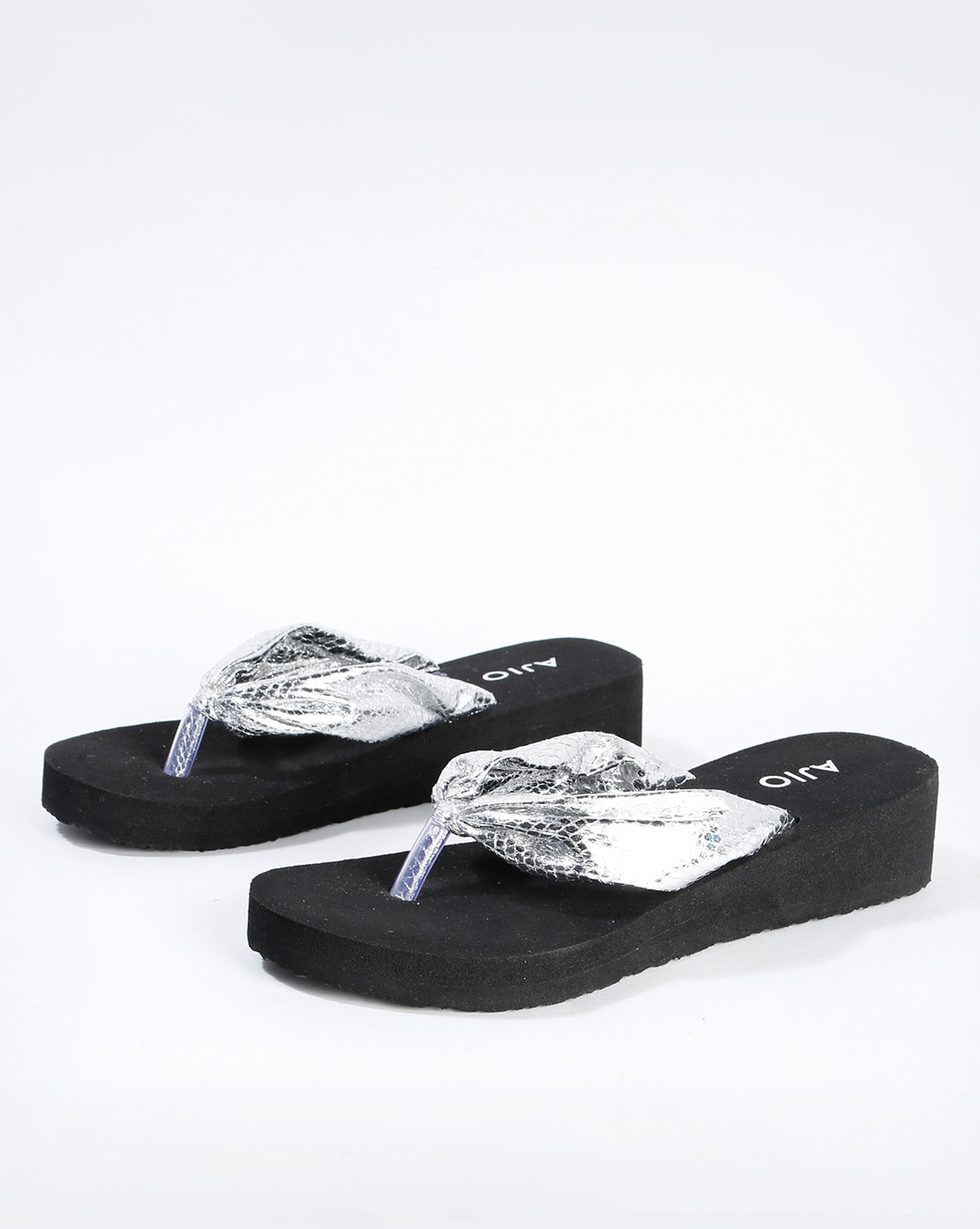 black and silver flip flops