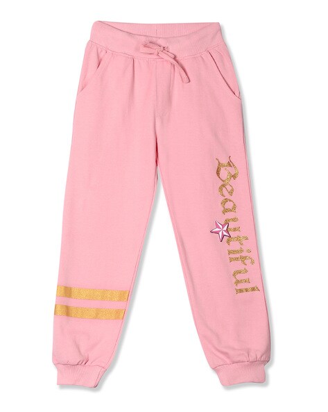 light pink track pants